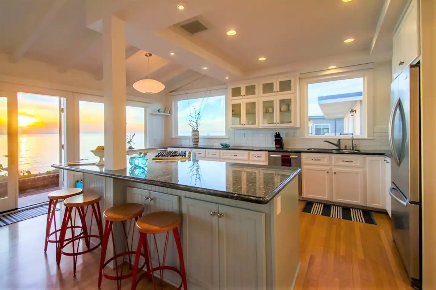 Enjoy sunsets while cooking in your oversized gourmet kitchen, doesn't get much better than this!!