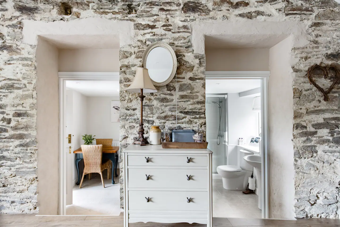 A view of dining area and bathroom